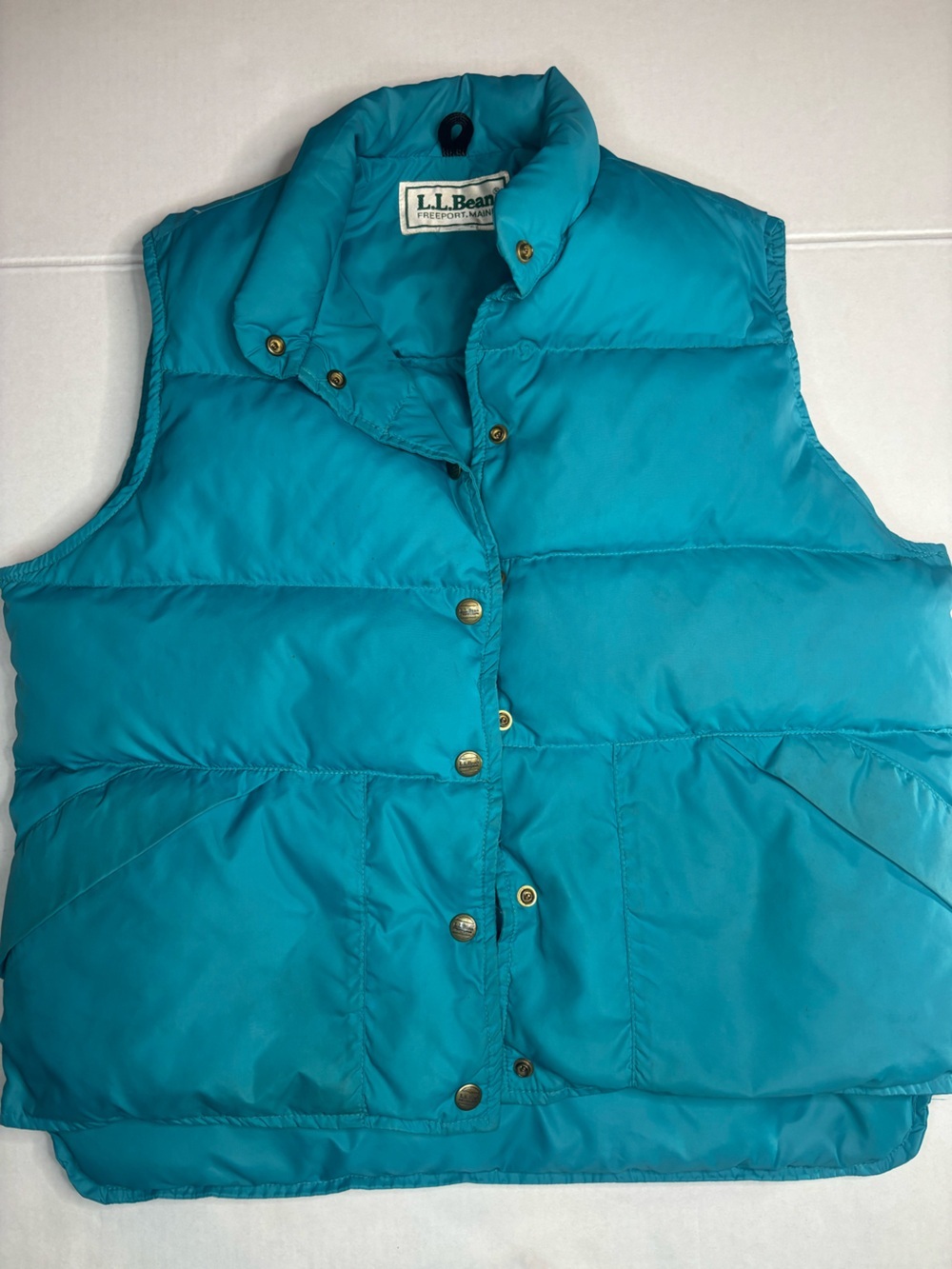 vintage L.L. Bean teal goose down puffer vest from the 1970s/1980s